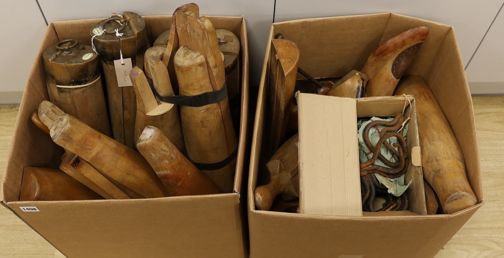 An assortment of beech boot-trees and folding boot hooks